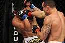 SAN JOSE, CA - NOVEMBER 19: (L-R) Gleison Tibau punches Rafael dos Anjos during an UFC Lightweight bout at the HP Pavilion in San Jose, California on November 19, 2011 in San Jose, California. (Photo by Josh Hedges/Zuffa LLC/Zuffa LLC via Getty Images)