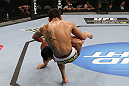 SAN JOSE, CA - NOVEMBER 19: (L-R) Gleison Tibau slams Rafael dos Anjos to the mat during an UFC Lightweight bout at the HP Pavillion on November 19, 2011 in San Jose, California.  (Photo by Josh Hedges/Zuffa LLC/Zuffa LLC via Getty Images)