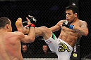 SAN JOSE, CA - NOVEMBER 19: (R-L) Rafael dos Anjos kicks Gleison Tibau during an UFC Lightweight bout at the HP Pavillion in San Jose, California on November 19, 2011 in San Jose, California.  (Photo by Josh Hedges/Zuffa LLC/Zuffa LLC via Getty Images)