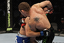 SAN JOSE, CA - NOVEMBER 19: Chris Weidman takes down Tom Lawlor to the mat during an UFC Middleweight bout at the HP Pavilion on November 19, 2011 in San Jose, California. (Photo by Josh Hedges/Zuffa LLC/Zuffa LLC via Getty Images)