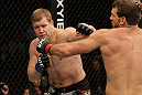SAN JOSE, CA - NOVEMBER 19: (R-L) Ryan Bader punches Jason Brilz during an UFC Light Heavywieght bout at the HP Pavillion on November 19, 2011 in San Jose, California.  (Photo by Josh Hedges/Zuffa LLC/Zuffa LLC via Getty Images)