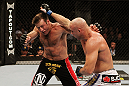 SAN JOSE, CA - NOVEMBER 19: (L-R) Stephan Bonnar dodges the punch of Kyle Kingsbury during an UFC Light Heavywieght bout at the HP Pavillion on November 19, 2011 in San Jose, California.  (Photo by Josh Hedges/Zuffa LLC/Zuffa LLC via Getty Images)