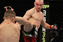 SAN JOSE, CA - NOVEMBER 19: (R-L) Martin Kampmann kicking Rick Story during an UFC Welterweight bout at the HP Pavillion on November 19, 2011 in San Jose, California. (Photo by Josh Hedges/Zuffa LLC/Zuffa LLC via Getty Images)