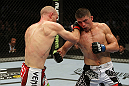 SAN JOSE, CA - NOVEMBER 19:  (L-R) Martin Kampmann punches Rick Story during an UFC Welterweight bout at the HP Pavillion on November 19, 2011 in San Jose, California.  (Photo by Josh Hedges/Zuffa LLC/Zuffa LLC via Getty Images)