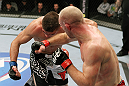 SAN JOSE, CA - NOVEMBER 19:  (R-L) Martin Kampmann punches Rick Story during an UFC Welterweight bout at the HP Pavillion on November 19, 2011 in San Jose, California.  (Photo by Josh Hedges/Zuffa LLC/Zuffa LLC via Getty Images)