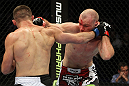 SAN JOSE, CA - NOVEMBER 19:  (R-L) Martin Kampmann and Rick Story exchange punches during an UFC Welterweight bout at the HP Pavillion on November 19, 2011 in San Jose, California.  (Photo by Josh Hedges/Zuffa LLC/Zuffa LLC via Getty Images)
