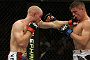 SAN JOSE, CA - NOVEMBER 19:  (L-R) Martin Kampmann punches Rick Story during an UFC Welterweight bout at the HP Pavillion on November 19, 2011 in San Jose, California.  (Photo by Josh Hedges/Zuffa LLC/Zuffa LLC via Getty Images)