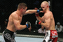 SAN JOSE, CA - NOVEMBER 19:  (L-R) Rick Story punches Martin Kampmann during an UFC Welterweight bout at the HP Pavillion on November 19, 2011 in San Jose, California.  (Photo by Josh Hedges/Zuffa LLC/Zuffa LLC via Getty Images)