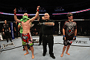 SAN JOSE, CA - NOVEMBER 19: (L-R) Martin Kampmann celebrates defeating Rick Story during an UFC Welterweight bout at the HP Pavillion on November 19, 2011 in San Jose, California.  (Photo by Josh Hedges/Zuffa LLC/Zuffa LLC via Getty Images)