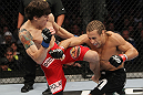 SAN JOSE, CA - NOVEMBER 19: (R-L) Urijah Faber has his punch blocked by Brian Bowles knee during an UFC Bantamweight bout at the HP Pavillion on November 19, 2011 in San Jose, California.  (Photo by Josh Hedges/Zuffa LLC/Zuffa LLC via Getty Images)