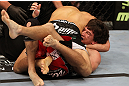 SAN JOSE, CA - NOVEMBER 19: Urijah Faber (top) holds Brian Bowles (bottom) in a head lock during an UFC Bantamweight bout at the HP Pavillion on November 19, 2011 in San Jose, California.  (Photo by Josh Hedges/Zuffa LLC/Zuffa LLC via Getty Images)