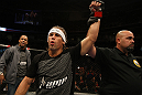 SAN JOSE, CA - NOVEMBER 19: Urijah Faber celebrates defeating Brian Bowles during an UFC Bantamweight bout at the HP Pavillion on November 19, 2011 in San Jose, California.  (Photo by Josh Hedges/Zuffa LLC/Zuffa LLC via Getty Images)