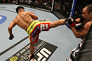 SAN JOSE, CA - NOVEMBER 19: (L-R) Cung Le back kicks Wanderlei Silva during an UFC Middleweight bout at the HP Pavillion on November 19, 2011 in San Jose, California.  (Photo by Josh Hedges/Zuffa LLC/Zuffa LLC via Getty Images)