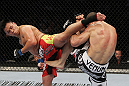 SAN JOSE, CA - NOVEMBER 19: (R-L) Wanderlei Silva and Cung Le exchange kicks during an UFC Middleweight bout at the HP Pavillion on November 19, 2011 in San Jose, California.  (Photo by Josh Hedges/Zuffa LLC/Zuffa LLC via Getty Images)