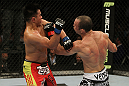 SAN JOSE, CA - NOVEMBER 19: (R-L) Wanderlei Silva punches Cung Le during an UFC Middleweight bout at the HP Pavillion on November 19, 2011 in San Jose, California.  (Photo by Josh Hedges/Zuffa LLC/Zuffa LLC via Getty Images)