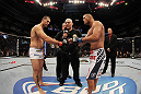 SAN JOSE, CA - NOVEMBER 19:  (R-L) Dan Henderson and Mauricio Rua touch gloves to start their UFC Light Heavyweight bout at the HP Pavillion on November 19, 2011 in San Jose, California.  (Photo by Josh Hedges/Zuffa LLC/Zuffa LLC via Getty Images)