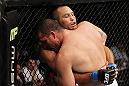 SAN JOSE, CA - NOVEMBER 19: (R-L) Mauricio Rua and Dan Henderson tie each other up during an UFC Light Heavyweight bout at the HP Pavillion on November 19, 2011 in San Jose, California.  (Photo by Josh Hedges/Zuffa LLC/Zuffa LLC via Getty Images)