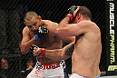 SAN JOSE, CA - NOVEMBER 19: (R-L) Mauricio Rua and Dan Henderson exchange punches during an UFC Light Heavyweight bout at the HP Pavillion on November 19, 2011 in San Jose, California.  (Photo by Josh Hedges/Zuffa LLC/Zuffa LLC via Getty Images)