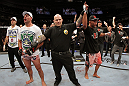 SAN JOSE, CA - NOVEMBER 19: (R-L) Dan Henderson celebrates defeating Mauricio Rua during an UFC Light Heavyweight bout at the HP Pavillion on November 19, 2011 in San Jose, California.  (Photo by Josh Hedges/Zuffa LLC/Zuffa LLC via Getty Images)