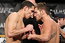 LAS VEGAS, NV - DECEMBER 02:  (L-R) Opponents Roland Delorme and Josh Ferguson face off after weighing in at the official weigh-in for The Ultimate Fighter 14 Finale at The Palms Casino Resort on December 2, 2011 in Las Vegas, Nevada.  (Photo by Josh Hedges/Zuffa LLC/Zuffa LLC via Getty Images)