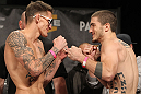 LAS VEGAS, NV - DECEMBER 02:  (L-R) Opponents Dustin Pague and John Albert face off after weighing in at the official weigh-in for The Ultimate Fighter 14 Finale at The Palms Casino Resort on December 2, 2011 in Las Vegas, Nevada.  (Photo by Josh Hedges/Zuffa LLC/Zuffa LLC via Getty Images)