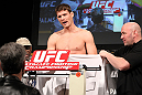 LAS VEGAS, NV - DECEMBER 02:  Michael Bisping pleads his case to a commission official after missing weight at the official weigh-in for The Ultimate Fighter 14 Finale at The Palms Casino Resort on December 2, 2011 in Las Vegas, Nevada.  (Photo by Josh Hedges/Zuffa LLC/Zuffa LLC via Getty Images)