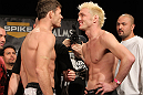 LAS VEGAS, NV - DECEMBER 02:  (L-R) Middleweight opponents Michael Bisping and Jason "Mayhem" Miller face off after weighing in at the official weigh-in for The Ultimate Fighter 14 Finale at The Palms Casino Resort on December 2, 2011 in Las Vegas, Nevada.  (Photo by Josh Hedges/Zuffa LLC/Zuffa LLC via Getty Images)