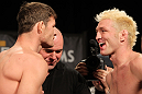 LAS VEGAS, NV - DECEMBER 02:  (L-R) Middleweight opponents Michael Bisping and Jason "Mayhem" Miller face off after weighing in at the official weigh-in for The Ultimate Fighter 14 Finale at The Palms Casino Resort on December 2, 2011 in Las Vegas, Nevada.  (Photo by Josh Hedges/Zuffa LLC/Zuffa LLC via Getty Images)