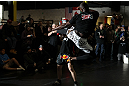 TORONTO, ON - DECEMBER 07:  UFC Light Heavyweight Champion Jon "Bones" Jones works out for the fans and media during the UFC 140 Open Workouts at the Xtreme Couture Gym on December 7, 2011 in Toronto, Ontario.  (Photo by Josh Hedges/Zuffa LLC/Zuffa LLC via Getty Images)
