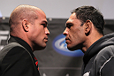 TORONTO, ON - DECEMBER 08:  (L-R) Light Heavyweight opponents Tito Ortiz and Antonio Rogerio "Minotoro" Nogueira face off at the final UFC 140 pre-fight press conference at Bell Tiff Lightbox Cinema1 on December 8, 2011 in Toronto, Canada.  (Photo by Josh Hedges/Zuffa LLC/Zuffa LLC via Getty Images)