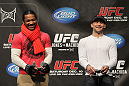 TORONTO, ON - DECEMBER 09:  (R-L) UFC Lightweight Champion Frankie Edgar and challenger Benson Henderson battle each other on the UFC Undisputed 3 videogame before the UFC 140 Official Weigh-in at the Air Canada Centre on December 9, 2011 in Toronto, Canada.  (Photo by Josh Hedges/Zuffa LLC/Zuffa LLC via Getty Images)