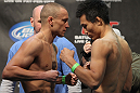 TORONTO, ON - DECEMBER 09:  (L-R) Featherweight opponents Mark Hominick and Chan Sung Jung face off after weighing in during the UFC 140 Official Weigh-in at the Air Canada Centre on December 9, 2011 in Toronto, Canada.  (Photo by Josh Hedges/Zuffa LLC/Zuffa LLC via Getty Images)