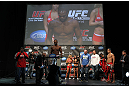 TORONTO, ON - DECEMBER 09:  UFC Light Heavyweight Champion Jon "Bones" Jones weighs in as opponent Lyoto Machida (red shorts) looks on during the UFC 140 Official Weigh-in at the Air Canada Centre on December 9, 2011 in Toronto, Canada.  (Photo by Josh Hedges/Zuffa LLC/Zuffa LLC via Getty Images)