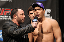 TORONTO, ON - DECEMBER 09:  (R-L) UFC Light Heavyweight title challenger Lyoto Machida is interviewed by Joe Rogan after the UFC 140 Official Weigh-in at the Air Canada Centre on December 9, 2011 in Toronto, Canada.  (Photo by Josh Hedges/Zuffa LLC/Zuffa LLC via Getty Images)