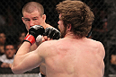 TORONTO, ON - DECEMBER 10:  (L-R) John Cholish punches Mitch Clarke during the UFC 140 event at Air Canada Centre on December 10, 2011 in Toronto, Canada.  (Photo by Nick Laham/Zuffa LLC/Zuffa LLC)