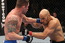 TORONTO, ON - DECEMBER 10:  (L-R) Jake Hecht punches Rich Attonito during the UFC 140 event at Air Canada Centre on December 10, 2011 in Toronto, Ontario, Canada.  (Photo by Nick Laham/Zuffa LLC/Zuffa LLC via Getty Images)