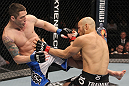 TORONTO, ON - DECEMBER 10:  (L-R) Jake Hecht kicks Rich Attonito during the UFC 140 event at Air Canada Centre on December 10, 2011 in Toronto, Ontario, Canada.  (Photo by Nick Laham/Zuffa LLC/Zuffa LLC via Getty Images)