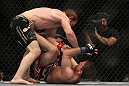 TORONTO, ON - DECEMBER 10:  Mark Bocek punches down at Nik Lentz on the ground during the UFC 140 event at Air Canada Centre on December 10, 2011 in Toronto, Ontario, Canada.  (Photo by Josh Hedges/Zuffa LLC/Zuffa LLC via Getty Images)