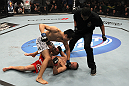 TORONTO, ON - DECEMBER 10: (L-R) "The Korean Zombie" Chan Sung Jung defeats Mark Hominick by knockout during the UFC 140 event at Air Canada Centre on December 10, 2011 in Toronto, Ontario, Canada. (Photo by Nick Laham/Zuffa LLC/Zuffa LLC via Getty Images)