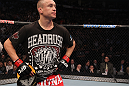 TORONTO, ON - DECEMBER 10:  Mark Hominick reacts after being knocked out by Chan Sung Jung during the UFC 140 event at Air Canada Centre on December 10, 2011 in Toronto, Ontario, Canada.  (Photo by Nick Laham/Zuffa LLC/Zuffa LLC via Getty Images)