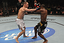 TORONTO, ON - DECEMBER 10:  Brian Ebersole (white shorts) punches Claude Patrick during the UFC 140 event at Air Canada Centre on December 10, 2011 in Toronto, Ontario, Canada.  (Photo by Nick Laham/Zuffa LLC/Zuffa LLC via Getty Images)