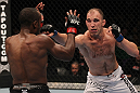 TORONTO, ON - DECEMBER 10:  Brian Ebersole (white shorts) punches Claude Patrick during the UFC 140 event at Air Canada Centre on December 10, 2011 in Toronto, Ontario, Canada.  (Photo by Nick Laham/Zuffa LLC/Zuffa LLC via Getty Images)