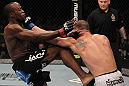 TORONTO, ON - DECEMBER 10:  Brian Ebersole (white shorts) punches Claude Patrick during the UFC 140 event at Air Canada Centre on December 10, 2011 in Toronto, Ontario, Canada.  (Photo by Nick Laham/Zuffa LLC/Zuffa LLC via Getty Images)