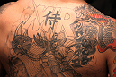 TORONTO, ON - DECEMBER 10:  A detail of a tattoo on the back of Frank Mir is seen as he prepares to enter the Octagon before his bout against Antonio Rodrigo Nogueira during the UFC 140 event at Air Canada Centre on December 10, 2011 in Toronto, Ontario, Canada.  (Photo by Nick Laham/Zuffa LLC/Zuffa LLC via Getty Images)