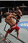 TORONTO, ON - DECEMBER 10:  (R-L) Jon "Bones" Jones kicks Lyoto Machida during the UFC 140 event at Air Canada Centre on December 10, 2011 in Toronto, Ontario, Canada.  (Photo by Nick Laham/Zuffa LLC/Zuffa LLC via Getty Images)