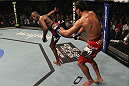 TORONTO, ON - DECEMBER 10:  (L-R) Jon "Bones" Jones kicks Lyoto Machida during the UFC 140 event at Air Canada Centre on December 10, 2011 in Toronto, Ontario, Canada.  (Photo by Nick Laham/Zuffa LLC/Zuffa LLC via Getty Images)