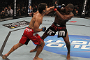 TORONTO, ON - DECEMBER 10:  (L-R) Lyoto Machida punches Jon "Bones" Jones during the UFC 140 event at Air Canada Centre on December 10, 2011 in Toronto, Ontario, Canada.  (Photo by Nick Laham/Zuffa LLC/Zuffa LLC via Getty Images)