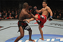 TORONTO, ON - DECEMBER 10:  (R-L) Lyoto Machida kicks Jon "Bones" Jones during the UFC 140 event at Air Canada Centre on December 10, 2011 in Toronto, Ontario, Canada.  (Photo by Nick Laham/Zuffa LLC/Zuffa LLC via Getty Images)