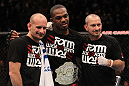 TORONTO, ON - DECEMBER 10:  UFC Light Heavyweight Champion Jon "Bones" Jones poses for a photo with his trainers Greg Jackson (L) and Mike Winklejohn (R) after defeating Lyoto Machida during the UFC 140 event at Air Canada Centre on December 10, 2011 in Toronto, Ontario, Canada.  (Photo by Nick Laham/Zuffa LLC/Zuffa LLC via Getty Images)