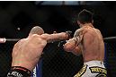 LAS VEGAS, NV - DECEMBER 30:  Manny Gamburyan (left) punches Diego Nunes (right) during the UFC 141 event at the MGM Grand Garden Arena on December 30, 2011 in Las Vegas, Nevada.  (Photo by Josh Hedges/Zuffa LLC/Zuffa LLC via Getty Images) *** Local Caption *** Manny Gamburyan; Diego Nunes